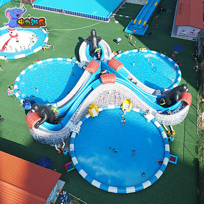 Good price Forest Adventure Inflatable Floating Castle Floating Water Slide Sunproof OEM online
